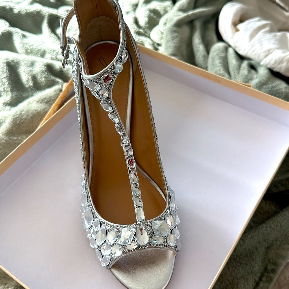 Jewel Badley Mischka high heel shoes
Wore once.
Size 9